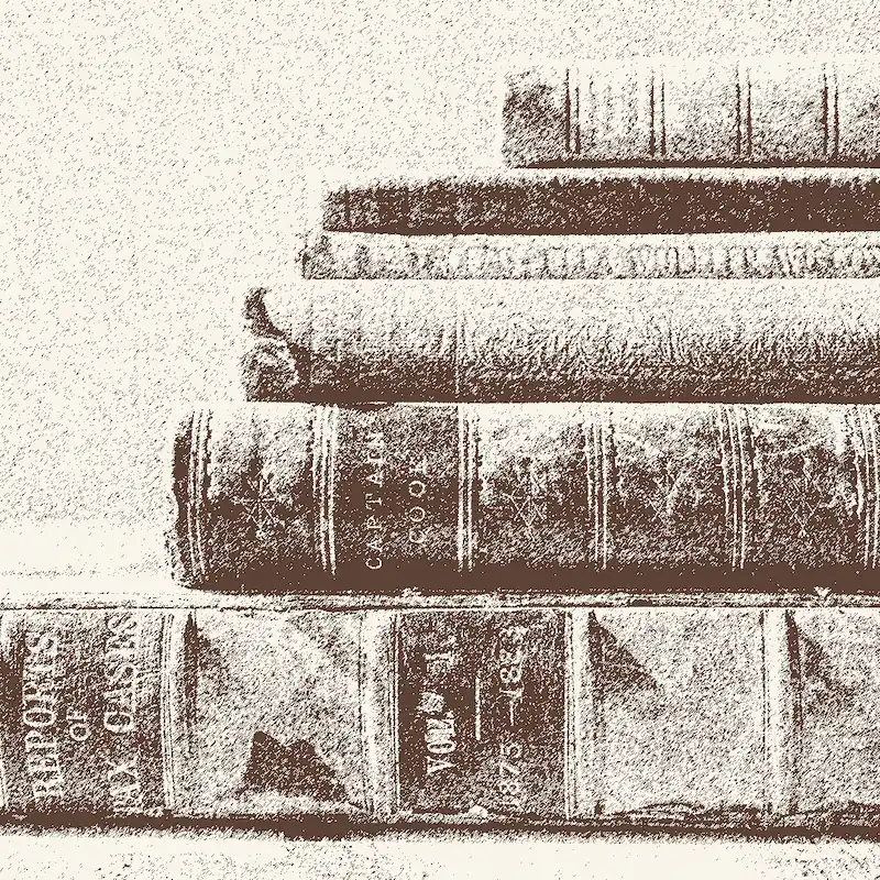 Six old books on top of each other in the background.
